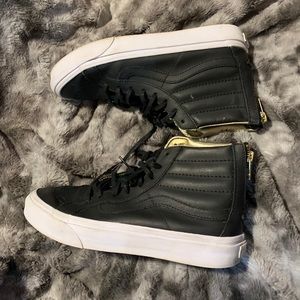 Black leather high top vans